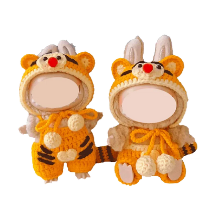 Redbook crochet outfit pattern for 17cm dolls featuring adorable animal-themed costumes with hoods and pom-poms