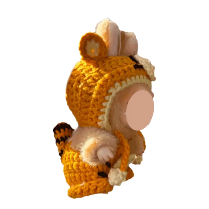 Yellow crochet outfit pattern for 17cm dolls featuring a tiger costume with ears and tail
