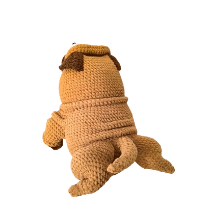 Handmade crochet pug doll shown from the back using crochet pug doll pattern in brown yarn