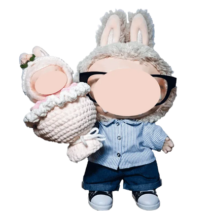 Cute doll wearing bunny ears holding a digital crochet bouquet pattern baby in white with pink accents