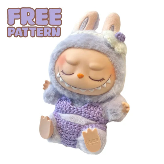 Free crochet bikini doll pattern featuring a cute doll wearing a purple crochet bikini and a fuzzy bunny outfit