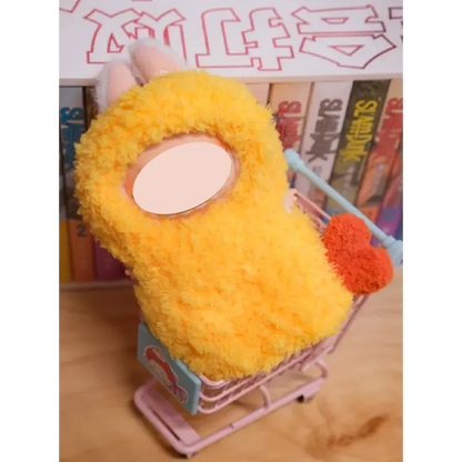 Crochet fried shrimp plush toy with fluffy yellow texture and small shopping cart showing FREE crochet fried shrimp plush pattern