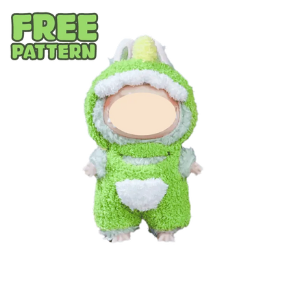 Cute doll dressed in a green dinosaur costume showcasing free dinosaur crochet pattern from redbook