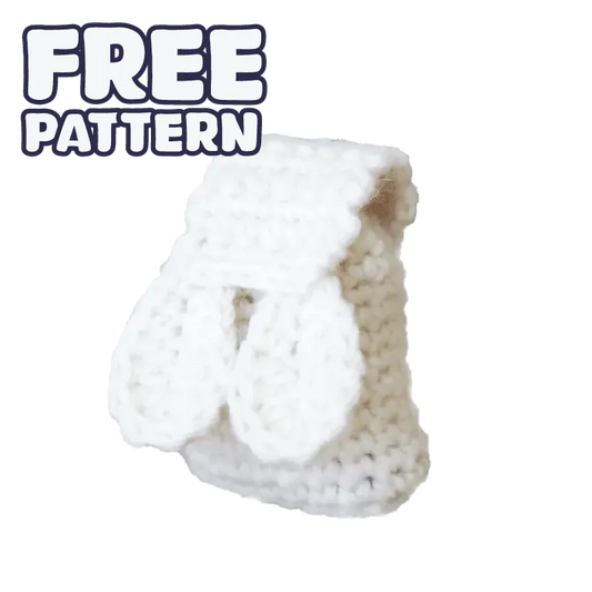 White crocheted miniature backpack with mittens using free doll accessories crochet pattern