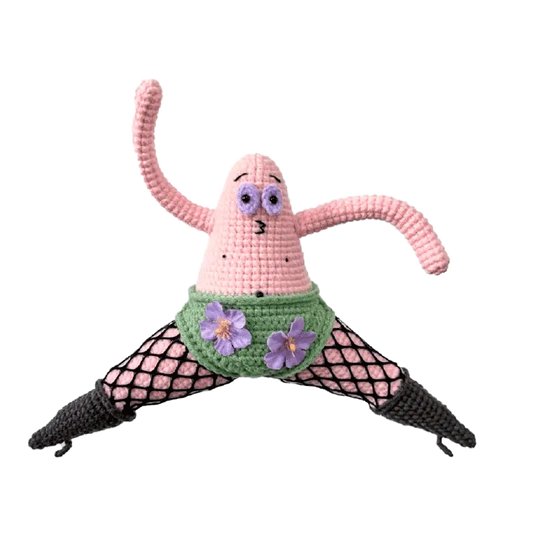 Funny amigurumi crochet pattern of a pink character with green floral shorts and fishnet stockings