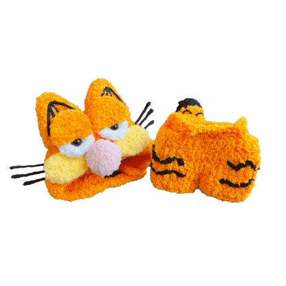 Garfield-inspired crochet pattern for dolls featuring detailed orange cat face and paws