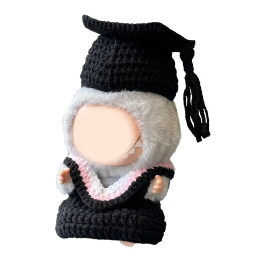 Handmade graduation doll crochet pattern featuring a cute figure in black cap and gown with pink and white details