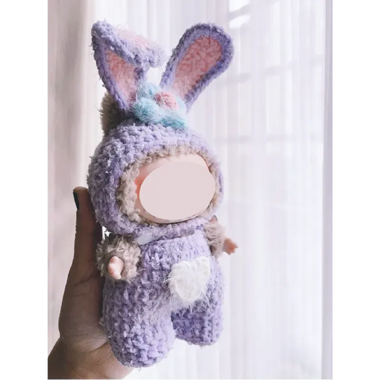 Collectible crochet dolls pattern featuring a handmade plush bunny doll in pastel purple and pink