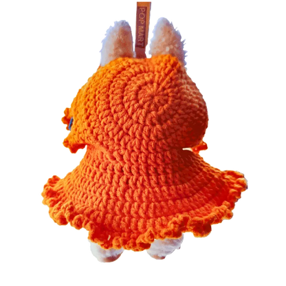 Handmade orange crocheted DIY Halloween doll costume with ruffled edges for small dolls