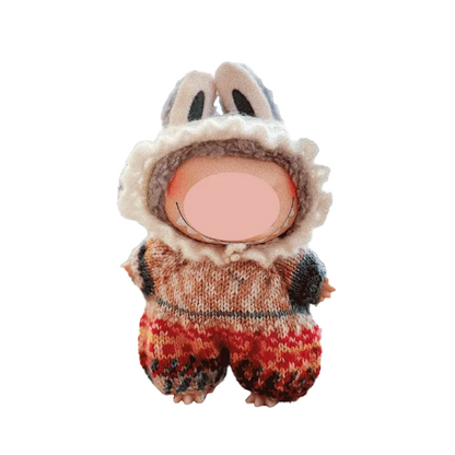 Cute knitted doll wearing bunny ears romper made with knitted doll romper pattern by Redbook