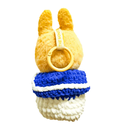 Handmade plush crochet Donald Duck bag keychain using crochet donald duck bag pattern in yellow blue and white