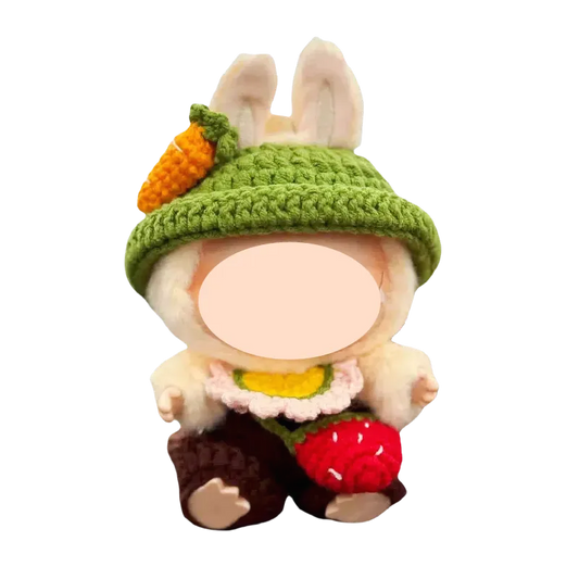Cute bunny doll wearing green hat with carrot and strawberry carrot doll crochet pattern by The Knit Krazy